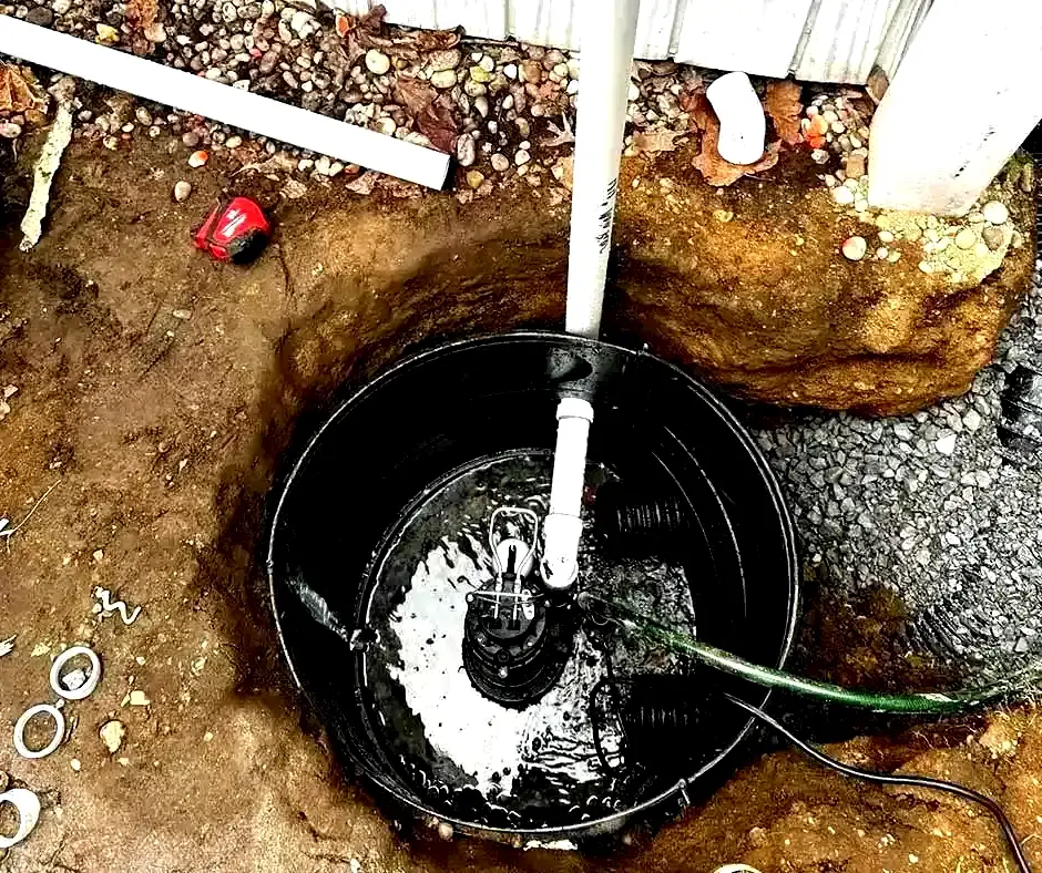 White drainage pipes connected Sump Pump Installation Dayton, OH White drainage pipes connected Sump Pump Installation Dayton, OH